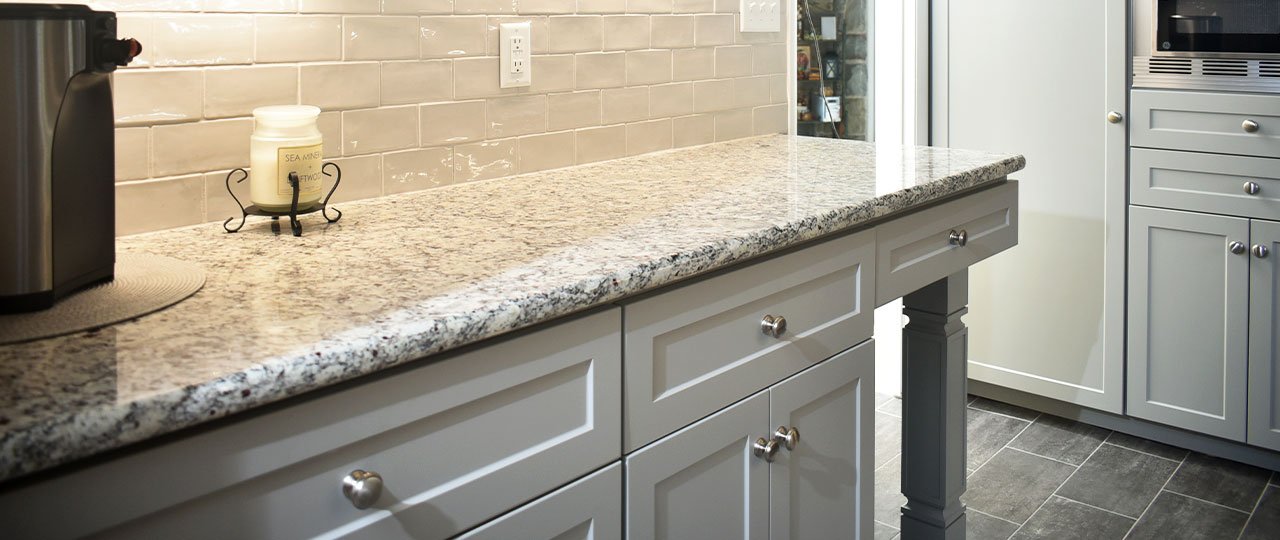 Granite is a natural stone with a smooth, natural look, making it one of the more popular kitchens' choices. It comes in an assortment of shades and patterns. Granite is a higher investment option, and requires consistent care and maintenance.