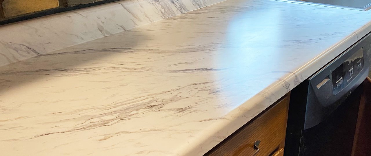 Laminate countertops are moderately durable and available in a wide variety of colors and patterns. Laminate is an inexpensive option that makes it popular for those who want to change their kitchen's look and feel without the permanence and investment of more expensive materials.